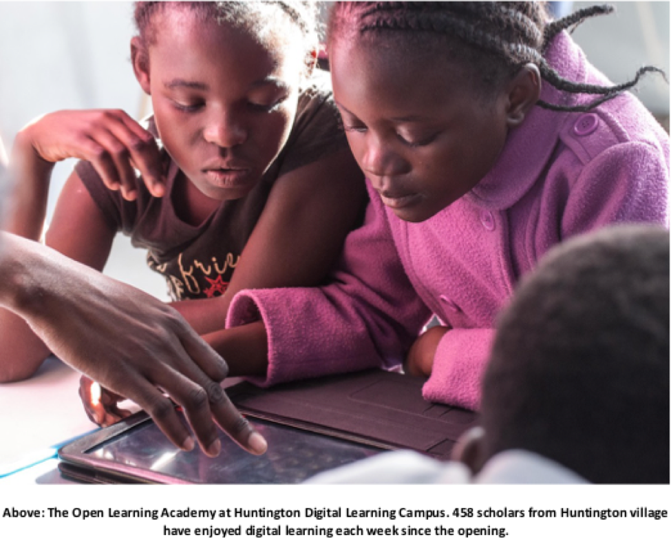 Photo showing young rural learners engaging with online learning material at the GWF Huntington campus