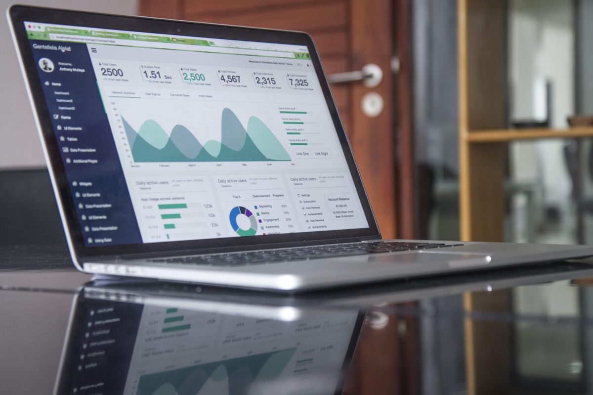Image of laptop showing data dashboard visualization